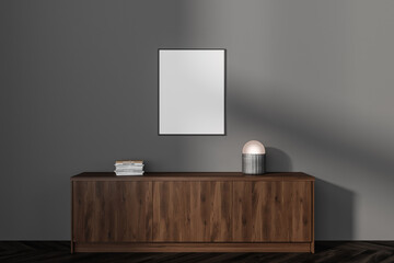 Gray living room with dresser and poster
