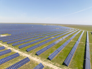 An aerial view of the large collection of solar panels or photovoltaic power station.