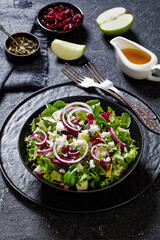 Green Salad with Apple, Cheese, Cranberry in bowl