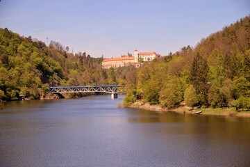 Fototapeta na wymiar A view to the castle above the river and bridge near Bitov, Czech republic