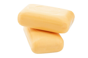 Two yellow toilet soap isolated on a white background.