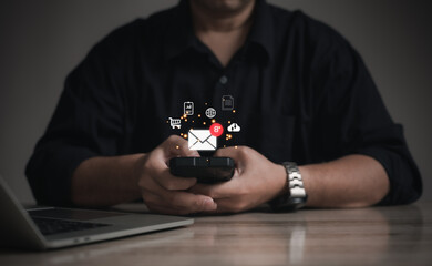 Business man using smartphone or mobile with notification virtual mail or message alert for social...
