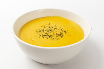 Sweet pumpkin soup on a white background