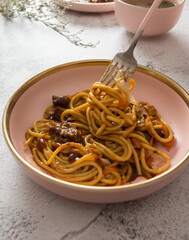 Stainless steel tableware and kitchen utensils placed on the desktop