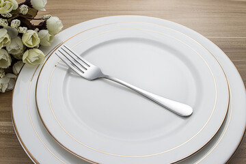 Stainless steel tableware and kitchen utensils placed on the desktop