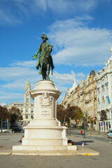 Fototapeta na wymiar The monument to King Pedro IV on his horse in Porto in Portugual