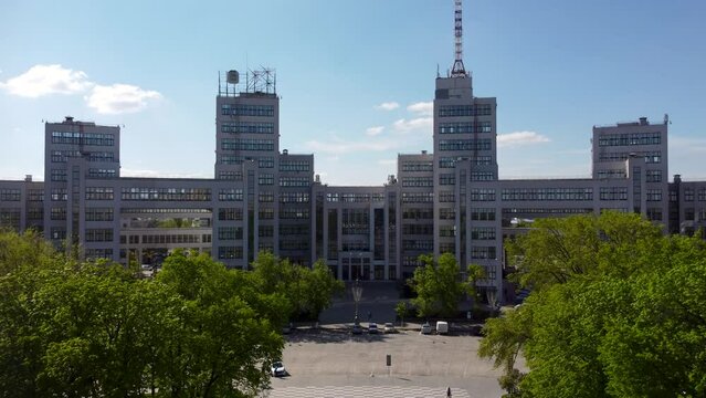 Aerial view on Derzhprom building with blue sky cloudscape in spring Kharkiv city center, Ukraine. Constructivist architecture