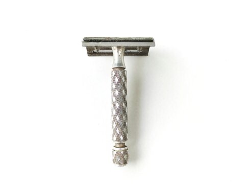 beard razor. Men's accessories for grooming looks. Lay flat. on a white background clipping path.