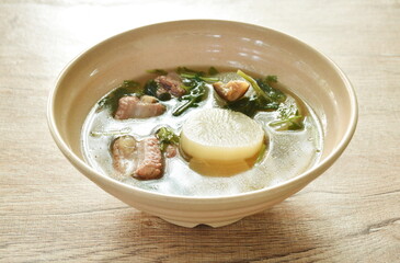 boiled slice radish with pork bone soup on bowl