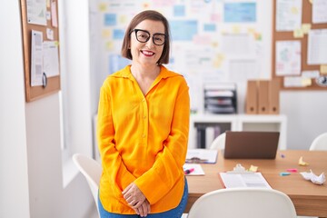 Middle age woman business worker smiling confident at office