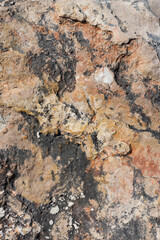natural weathered red brown and black rock texture abstract background