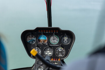 Speedometer and other sensors inside the helicopter cockpit