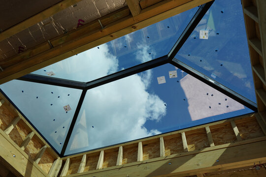 house construction. glass made on the roof. Glass to the sky. home lighting