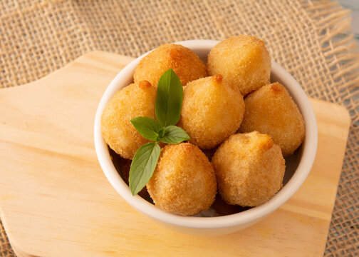 A pile of Party Snacks on a bowl, Brazilian Chicken Coxinha