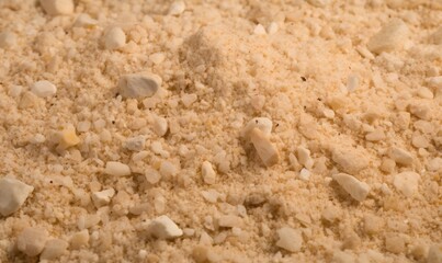 Fototapeta na wymiar a close up of a mixture of sand and rocks on a table. generative ai