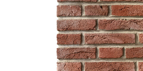 Sample of old brick wall isolated on white background with copy space. Detail of brick house closeup.