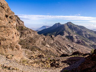 Walking from Pico de las Nieves to Cruz Grande on the island of Gran Canaria, Canary Islands, Spain - 599934494