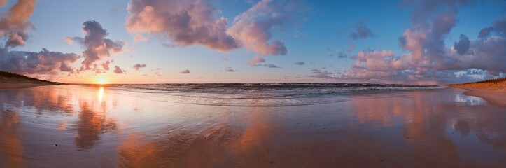 Panorama of the Baltic Sea at sunset in Poland - 599936247