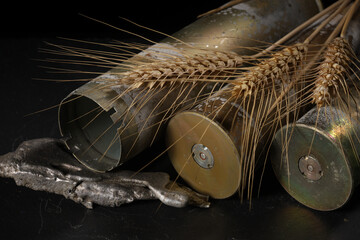 Front view of wheat and war debris on anti-aircraft shells