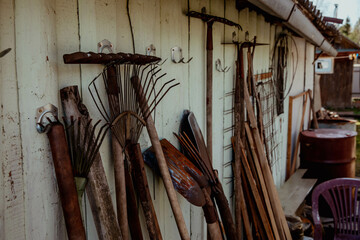 Fototapeta na wymiar Garden equipment: shovels, rakes, hoes