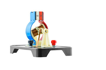 Experimental electric DC generator isolated on white, consists of copper coils and magnets. A...