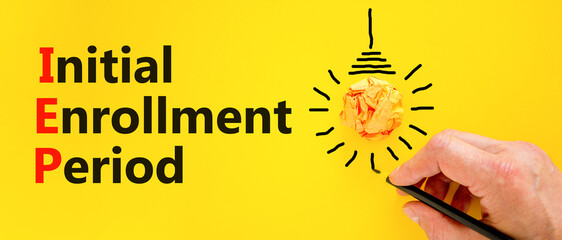 IEP symbol. Concept words IEP Initial enrollment period on beautiful yellow paper. Beautiful yellow...