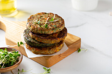 Vegan baked fritters stack healthy food and micro green