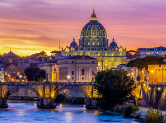 Naklejka na ściany i meble St. Peter's basilica dome and St. Angel bridge over Tiber river at sunset in Rome, Italy