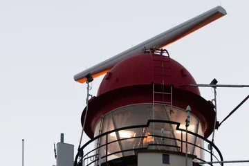 Gordijnen close up of the red lighthouse in Schiermonnikoog an island of the dutch wadden islands © Daniel Doorakkers