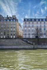 Fototapeta na wymiar Paris, ile saint-louis and quai de Bourbon, beautiful ancient buildings