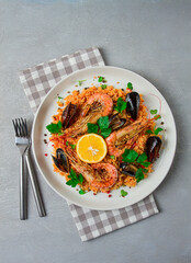 Seafood paella, shrimp and mussels risotto, rice, homemade, top view, no people,