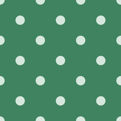 White Polka dot on green background. Polka dot background. White Polka dots trendy on dark blue background, tile. For fabric pattern, card, decor, wrapping paper	
