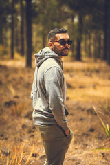 man walking in the woods