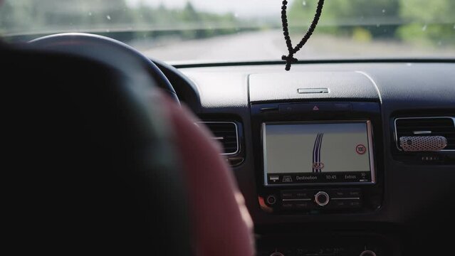 Businessman drive on road trip with view of navigation car system