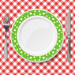 Green vector dish with pattern of chaotic white pattern placed on red check classic table cloth