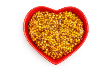 Bowl with french mustard isolated on white background with full depth of field. Top view. Flat lay.