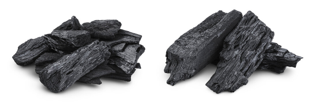 Natural wooden charcoal isolated on white background with full depth of field