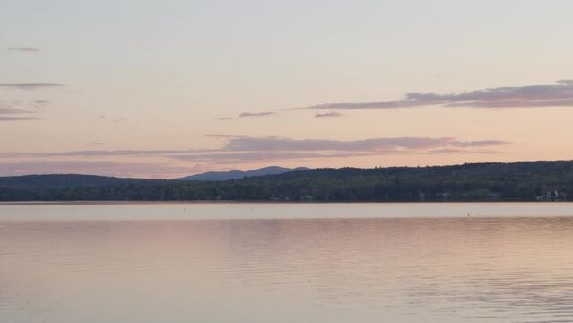memphremagog lake in quebec canada magog time lapse water mountain sunset panoramic panning 