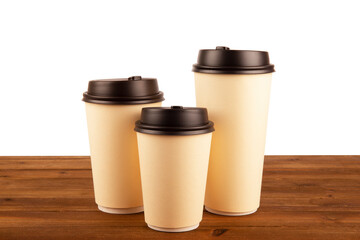 Three sizes of cups of coffee isolated on a white background. Copy space for your text or your image. - 599983876