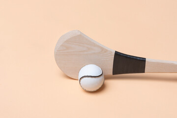 Hurling bat and sloitar on beige background. Horizontal sport theme poster, greeting cards, headers, website and app