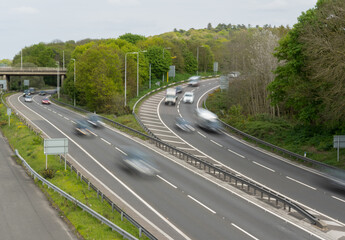 Traffic on the M25 at the Thorpe interchange. The M3 and M25 smart motorways meet at this interchange.