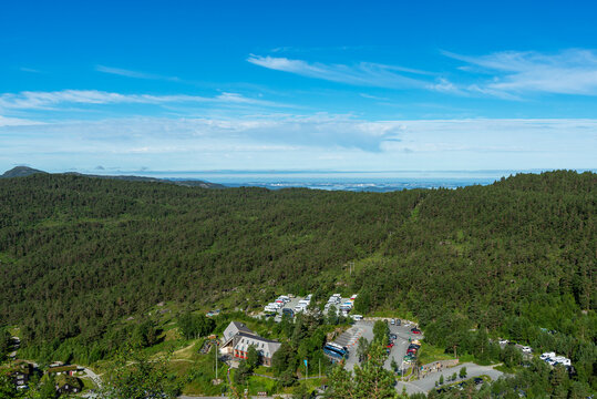 View from the trail to the Prikestolen to the parking area and the visitor center; Stavanger in the distance - Powered by Adobe