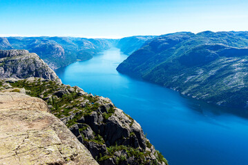 Fototapeta na wymiar Spectacular view from the famous Preikestolen (Pulpit Rock) over the Lysefjord near Stavanger, Norway