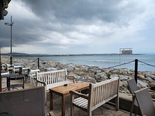 View of the sea from a cafe on a cloudy summer day