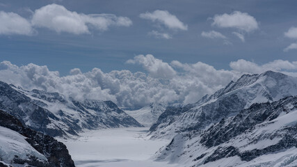Fototapeta na wymiar Snow-covered Swiss Jungfrau and surrounding mountains