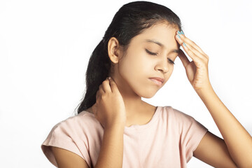 indian girl suffering from cold and flu fever having pain in the head
