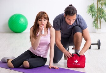 Young woman feeling bad during training in first aid concept
