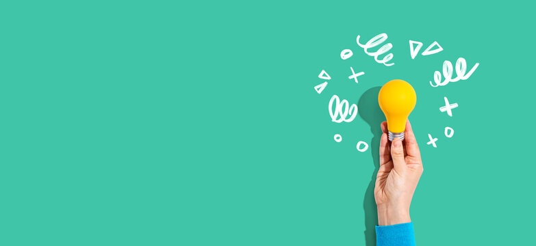 Idea light bulb with hand drawing sketch - Flat lay