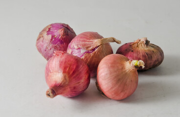 red onions on a white background