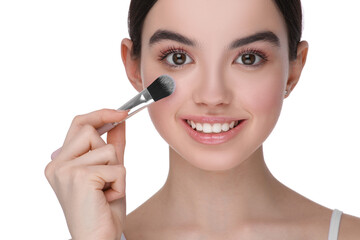 Teenage girl with makeup brush on white background